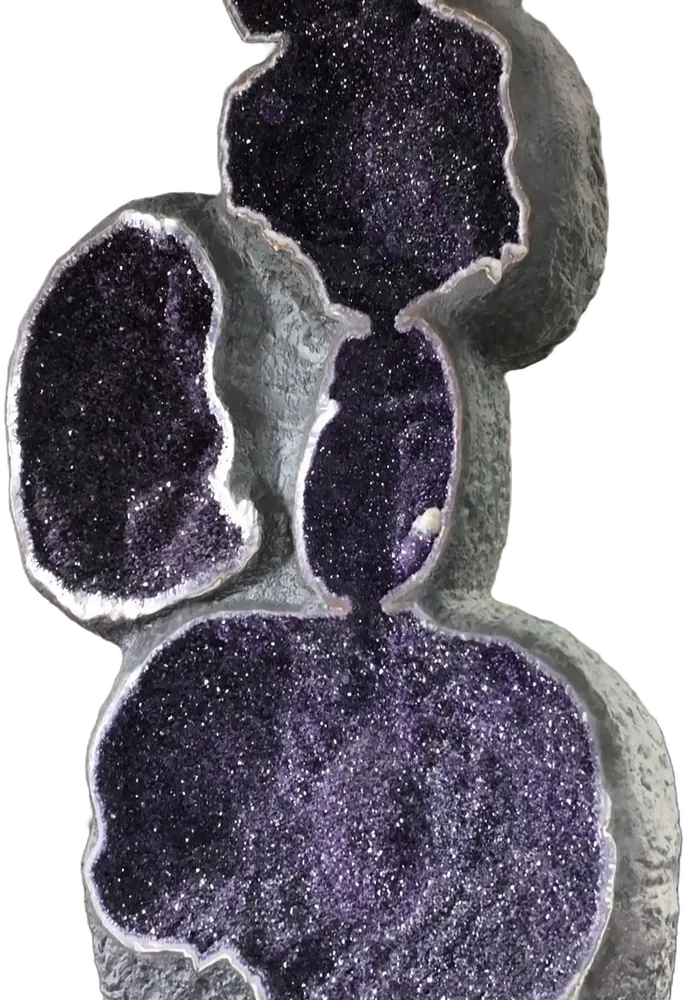 Large amethyst geode with several cavities